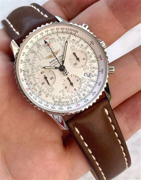 breitling navitimer world white dial brown leather bracelet|Breitling Navitimer best price.